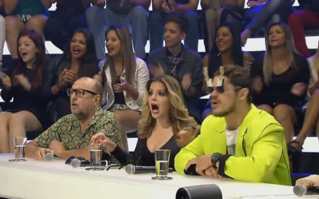 Reação de Xico Sá, Mariana Santos e José Loreto ao verem os surfistas naturalistas no palco do "Amor & Sexo" (Foto: Divulgação)