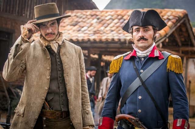 Rubião (Mateus Solano) e Tolentino (Ricardo Pereira) (Foto: Globo/Paulo Belote)