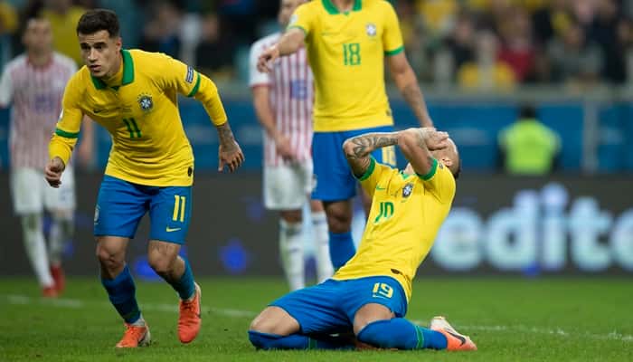 Os jogadores Philipe Coutinho e Everton no jogo Brasil x Paraguai pela Copa América (Foto: Lucas Figueiredo/CBF)