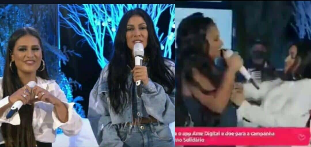 Blusa de Simone abre durante live e cantora é "socorrida" pela irmã (Foto: Reprodução)