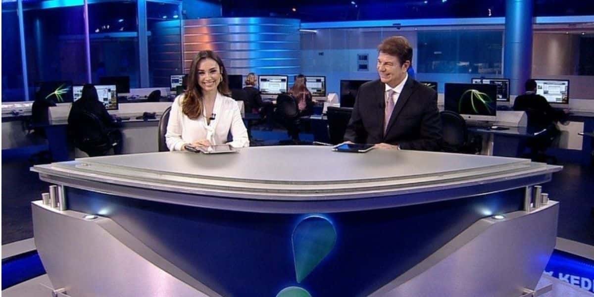 Millena Machado e Augusto Xavier apresentavam o RedeTv News