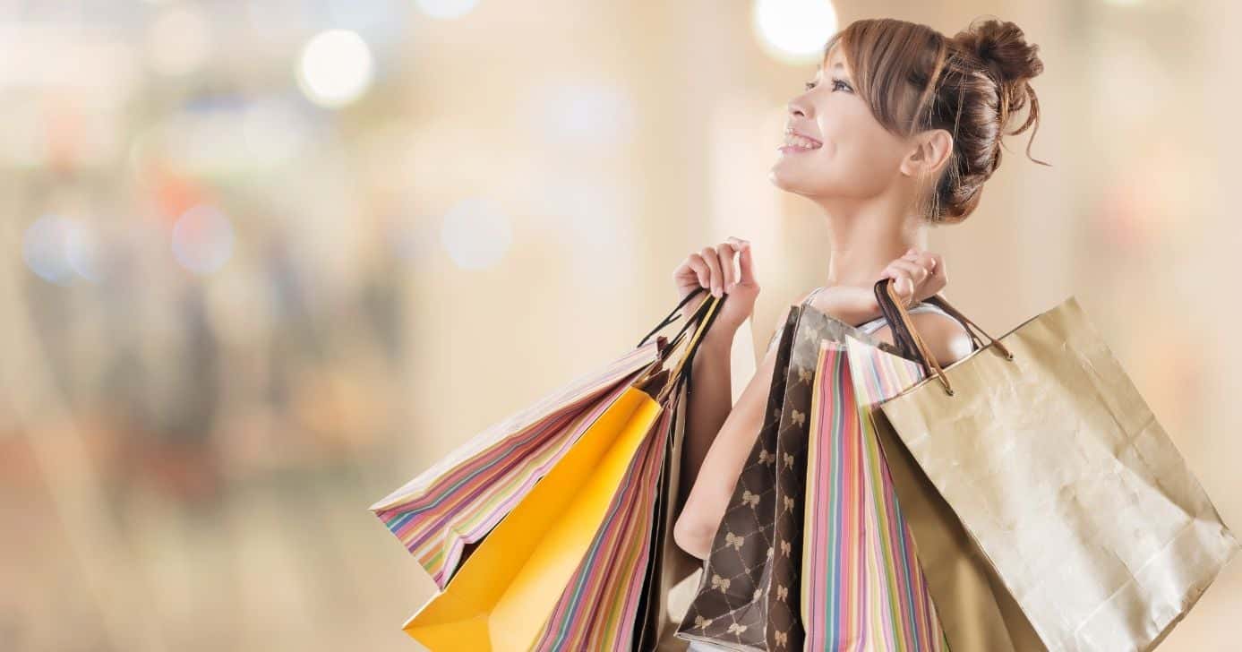 Ilustração mulher em shopping (Foto: Canva)