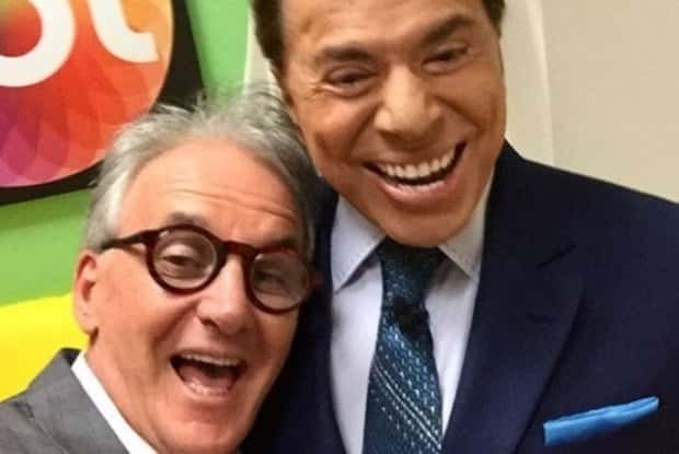 Otávio feliz ao lado de Silvio Santos. (Foto: Reprodução/Instagram
