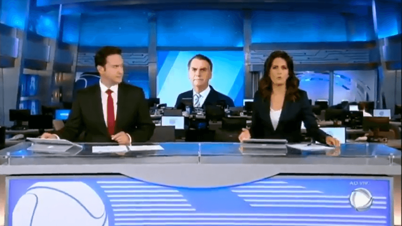 Adriana Araújo e Eduardo Ribeiro no comando do Jornal da Record. (Foto: Reprodução)