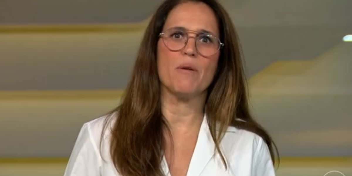 Ana Luiza Guimarães, substituta de Ana Paula Araújo, enche o peito ao dar notícia sobre assassinato de famoso (Foto: Bom Dia Brasil da Globo)