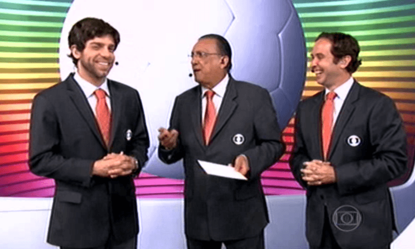 Juninho Pernambucano ao lado de Galvão Bueno e Caio Ribeiro em transmissão da Globo (Foto: Reprodução/Globo) Juninho Pernambucano ao lado de Galvão Bueno e Caio Ribeiro em transmissão da Globo (Foto: Reprodução/Globo)