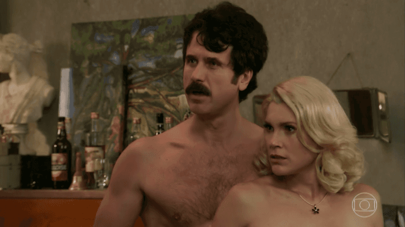 Ernesto (Eriberto Leão) e Sandra (Flávia Alessandra) em cena de "Êta Mundo Bom" (Foto: Reprodução/Globo) Ernesto (Eriberto Leão) e Sandra (Flávia Alessandra) em cena de "Êta Mundo Bom" (Foto: Reprodução/Globo)