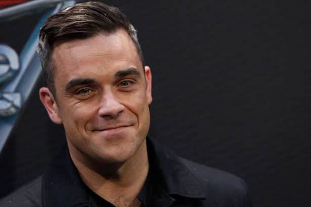 O cantor Robbie Williams (Foto: Divulgação) O cantor Robbie Williams (Foto: Divulgação)