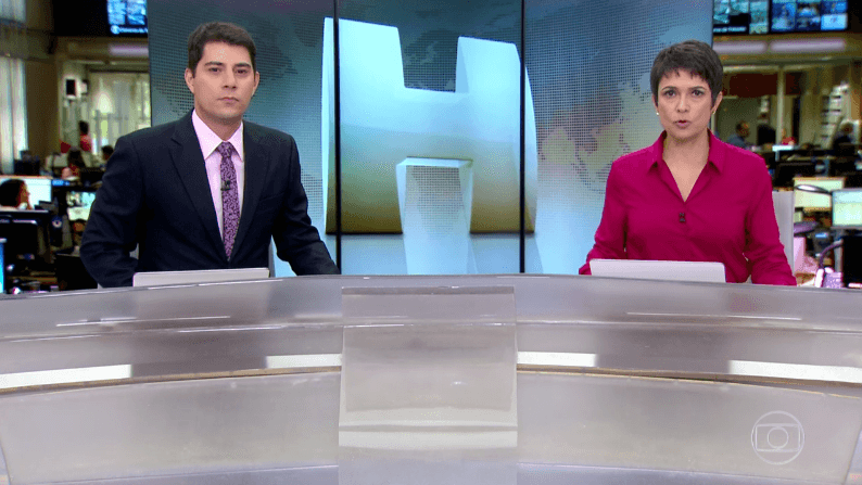 Evaristo Costa e Sandra Annenberg no "Jornal Hoje" (Foto: Reprodução/Globo) Evaristo Costa e Sandra Annenberg no "Jornal Hoje" (Foto: Reprodução/Globo)