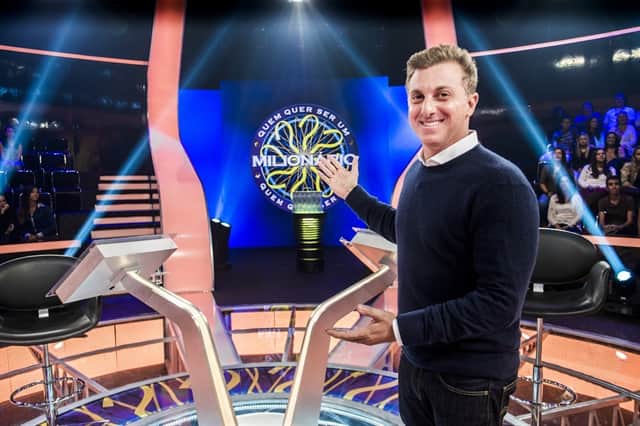Luciano Huck apresenta o 'Quem Quer Ser Um Milionário?' no 'Caldeirão' (Foto: Globo/João Miguel Júnior) Luciano Huck apresenta o 'Quem Quer Ser Um Milionário?' no 'Caldeirão' (Foto: Globo/João Miguel Júnior)