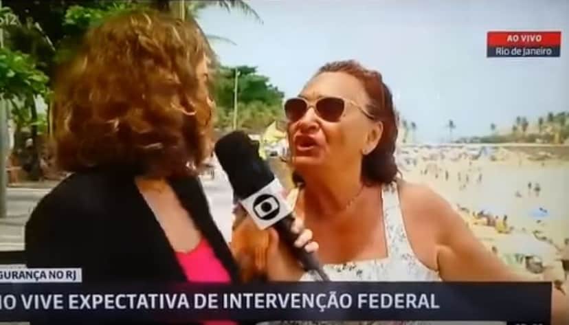 Mulher se manifestou contra a Globo ao vivo (Foto: Reprodução/GloboNews) Mulher se manifestou contra a Globo ao vivo (Foto: Reprodução/GloboNews)