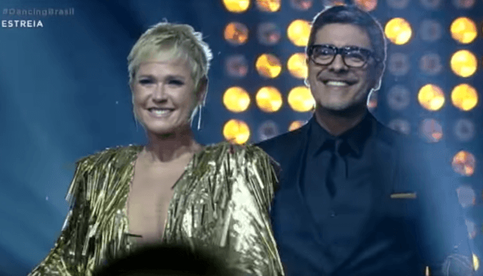 Xuxa e Junno Andrade na estreia da 4ª temporada do Dancing Brasil (Foto: Reprodução/Record) Xuxa e Junno Andrade na estreia da 4ª temporada do Dancing Brasil (Foto: Reprodução/Record)