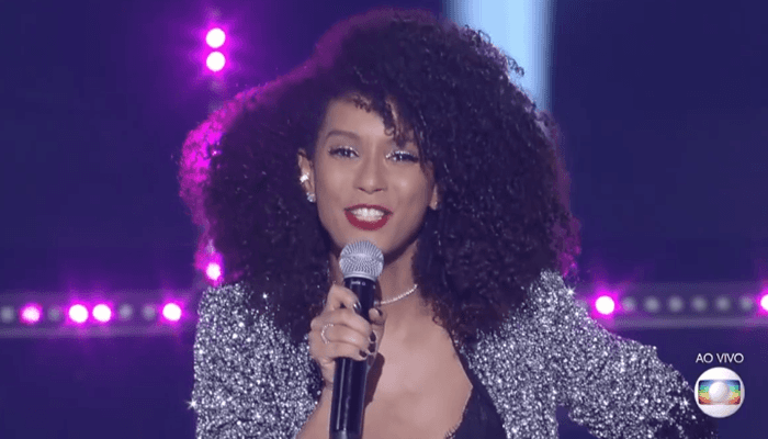 A apresentadora Taís Araújo na final da 2ª temporada do PopStar (Foto: Reprodução/Globo) A apresentadora Taís Araújo na final da 2ª temporada do PopStar (Foto: Reprodução/Globo)