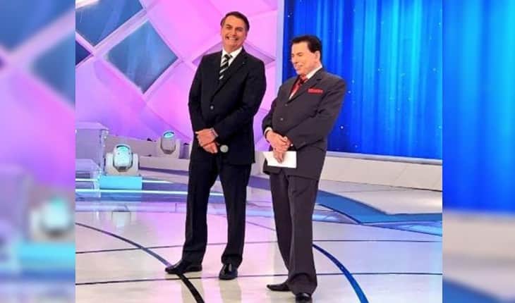 Silvio Santos e Jair Bolsonaro no palco do SBT (Foto UOL) Silvio Santos e Jair Bolsonaro no palco do SBT (Foto UOL)