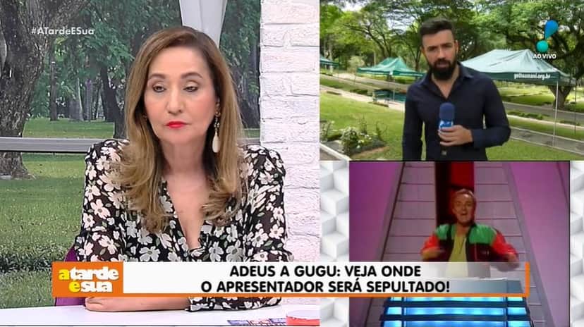 Sonia Abrão e Bruno Tálamo mostram a cova de Gugu (Foto: Reprodução/YouTube) Sonia Abrão e Bruno Tálamo mostram a cova de Gugu (Foto: Reprodução/YouTube)