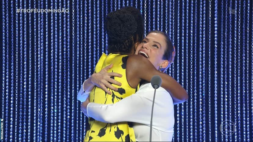 Renata Vasconcellos comemora com Maju Coutinho resultado do Troféu Domingão de 2019 (Foto: Reprodução) Renata Vasconcellos comemora com Maju Coutinho resultado do Troféu Domingão de 2019 (Foto: Reprodução)