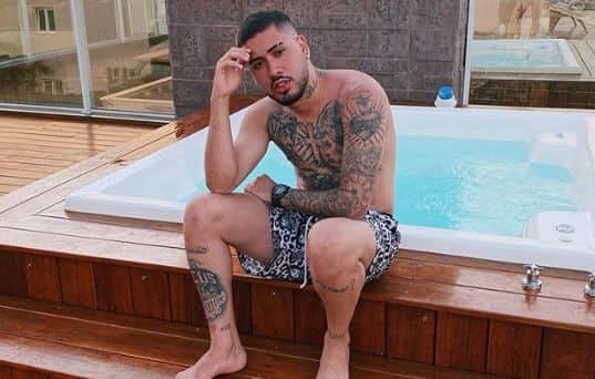 Ex de Flávia Pavanelli, o famoso cantor e funkeiro, Kevinho deixou os seus seguidores de queixo caído ao falar sobre tatuagem com namorada (Foto: Reprodução/Instagram) Ex de Flávia Pavanelli, o famoso cantor e funkeiro, Kevinho deixou os seus seguidores de queixo caído ao falar sobre tatuagem com namorada (Foto: Reprodução/Instagram)
