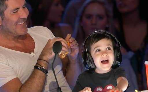 Simon Cowell e o filho Eric (Foto: Reprodução) Simon Cowell e o filho Eric (Foto: Reprodução)