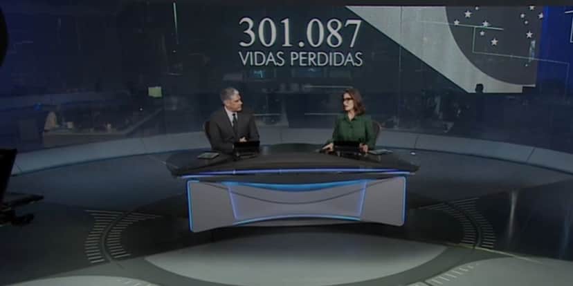Renata Vasconcellos e William Bonner encerrando Jornal Nacional com novo recorde de mortes (Foto: Reprodução/Globo) Renata Vasconcellos e William Bonner encerrando Jornal Nacional com novo recorde de mortes (Foto: Reprodução/Globo)