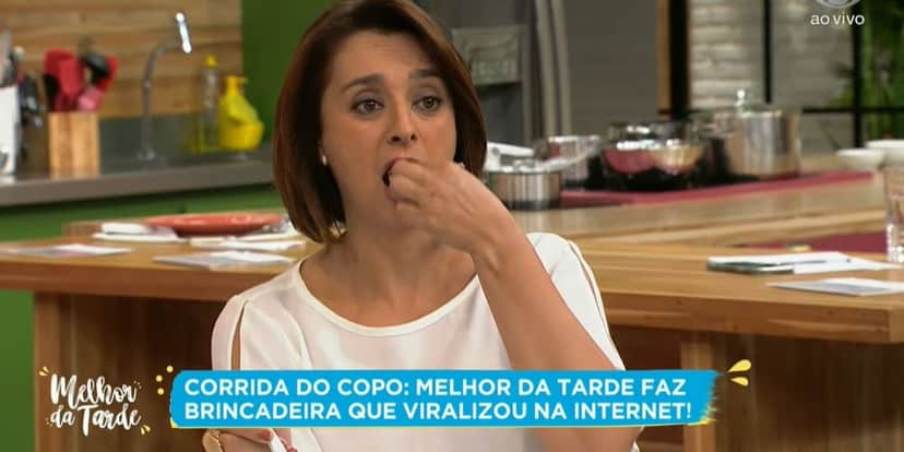 Catia Fonseca comendo alho ao vivo (Reprodução/Band) Catia Fonseca comendo alho ao vivo (Reprodução/Band)