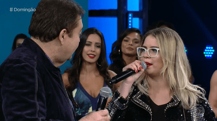 Faustão voltou à Globo em VT sobre Marília Mendonça - Foto: Reprodução Faustão voltou à Globo em VT sobre Marília Mendonça - Foto: Reprodução
