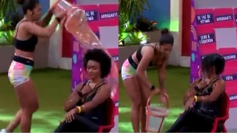 Maria despeja balde de água com força na cabeça de Natália e bate com tudo na cabeça da sister (Reprodução/ TV Globo)