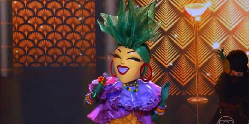 Quem será a famosa por trás da fantasia de Abacaxi? (Foto: Reprodução) Quem será a famosa por trás da fantasia de Abacaxi? (Foto: Reprodução)