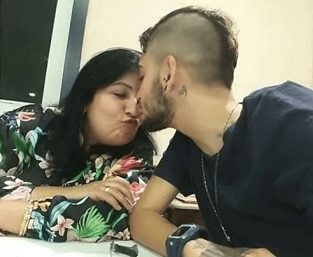 A mãe, Cláudia, ao lado do filho (Foto: Divulgação) A mãe, Cláudia, ao lado do filho (Foto: Divulgação)