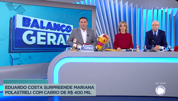 Gottino, Keila Jimenez e Lombardi na bancada de "A Hora da Venenosa", no Balanço Geral, na Record (Foto Reprodução/PlayPlus) Gottino, Keila Jimenez e Lombardi na bancada de "A Hora da Venenosa", no Balanço Geral, na Record (Foto Reprodução/PlayPlus)