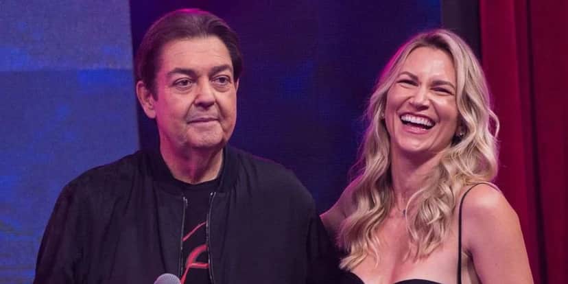 A jornalista ao lado de Faustão no programa (Reprodução: Band) A jornalista ao lado de Faustão no programa (Reprodução: Band)