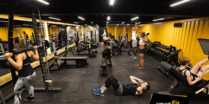 Pessoas treinando na Smarte Fit (Foto: Reprodução, Site da Rede de academia) Pessoas treinando na Smarte Fit (Foto: Reprodução, Site da Rede de academia)