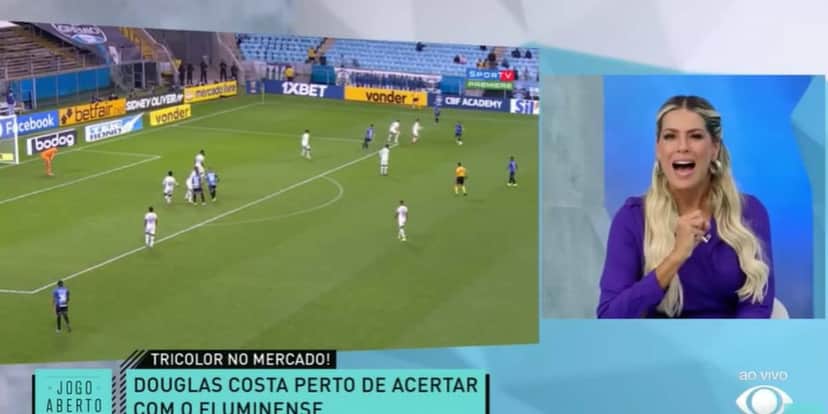 Renata Fan comenta sobre a ida de Douglas Costa ao Flu (Reprodução: Band) Renata Fan comenta sobre a ida de Douglas Costa ao Flu (Reprodução: Band)