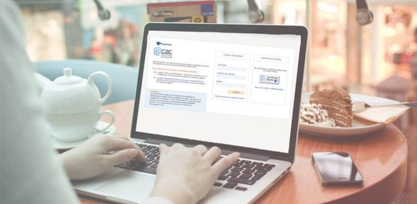 O e-CAC, foi Originado em 2005 e seu principal objetivo é agilizar e simplificar o atendimento ao público (Foto Reprodução/Receita Federal) O e-CAC, foi Originado em 2005 e seu principal objetivo é agilizar e simplificar o atendimento ao público (Foto Reprodução/Receita Federal)