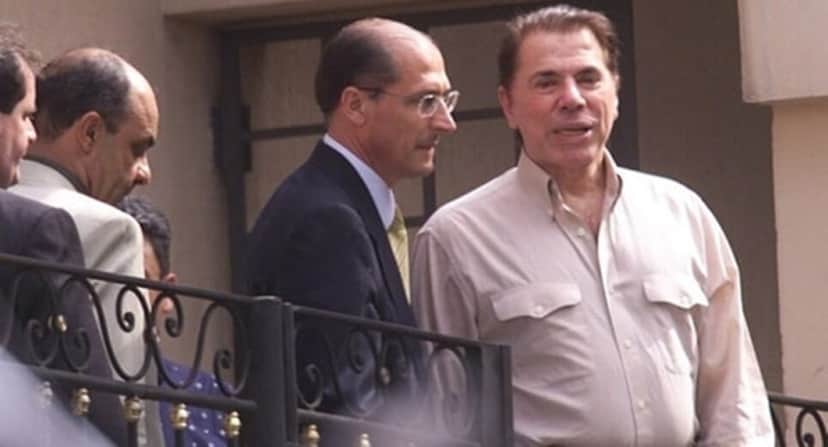 O ex-Governador Geraldo Alckmin acompanhando o dono do SBT após o sequestro (Foto: Reprodução)