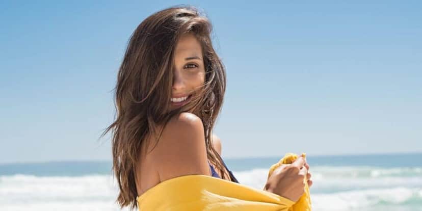 Modelo na praia (Foto: Canva) Modelo na praia (Foto: Canva)