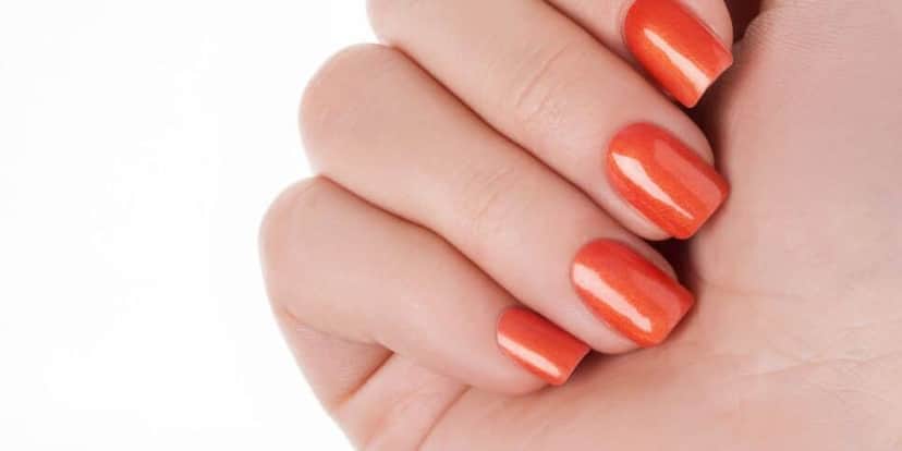 Unhas laranja (Foto: Canva) Unhas laranja (Foto: Canva)