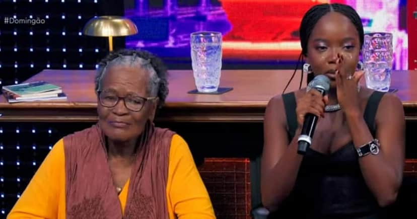 Clara Moneke ao lado da avó no Domingão com Huck (Foto: Reprodução/Globo) Clara Moneke ao lado da avó no Domingão com Huck (Foto: Reprodução/Globo)