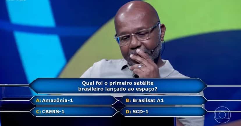 Osvaldo no quadro Quem Quer Ser Um Milionário (Foto: Reprodução / Domingão com Huck / Globo) Osvaldo no quadro Quem Quer Ser Um Milionário (Foto: Reprodução / Domingão com Huck / Globo)