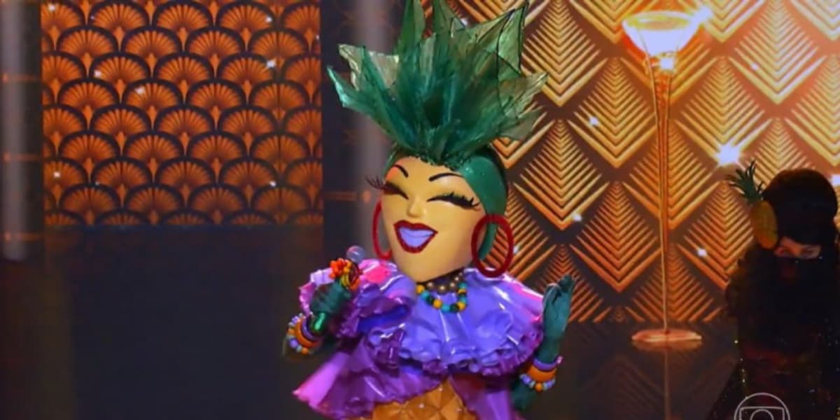 Quem será a famosa por trás da fantasia de Abacaxi? (Foto: Reprodução) Quem será a famosa por trás da fantasia de Abacaxi? (Foto: Reprodução)