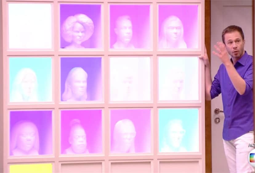 Painel na sala da casa do BBB19 mostra o rosto de todos os participantes (Foto reprodução) Painel na sala da casa do BBB19 mostra o rosto de todos os participantes (Foto reprodução)