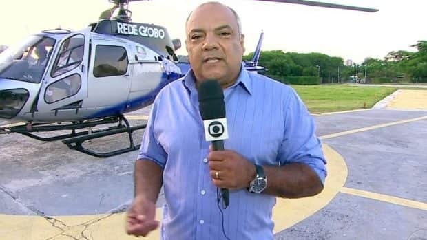 O repórter da Globo, Genilson Araújo se emocionou ao ver um cartaz de crianças de uma creche (Imagens: reprodução) O repórter da Globo, Genilson Araújo se emocionou ao ver um cartaz de crianças de uma creche (Imagens: reprodução)