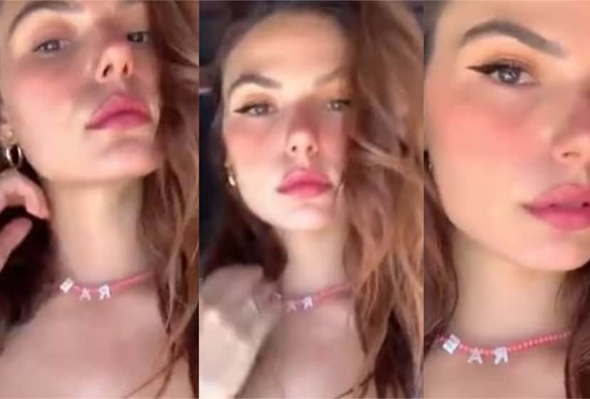 Isis Valverde exibindo acessório no pescoço com o nome do filho Rael (Reprodução: Redes Sociais) Isis Valverde exibindo acessório no pescoço com o nome do filho Rael (Reprodução: Redes Sociais)