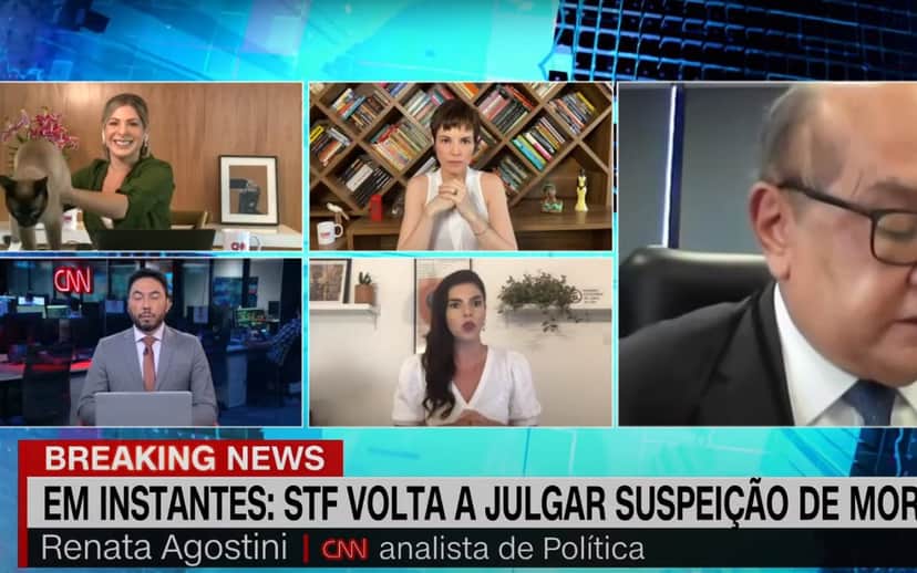 Daniela Lima (no alto, à esq.) quebra protocolo após a invasão de sua gata durante o telejornal da CNN Brasil (Foto: Reprodução) Daniela Lima (no alto, à esq.) quebra protocolo após a invasão de sua gata durante o telejornal da CNN Brasil (Foto: Reprodução)
