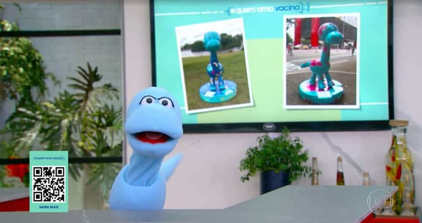 O mascote Robson apareceu no programa "Mais Você", ao lado de Ana Maria Braga (Foto: Reprodução/TV Globo) O mascote Robson apareceu no programa "Mais Você", ao lado de Ana Maria Braga (Foto: Reprodução/TV Globo)