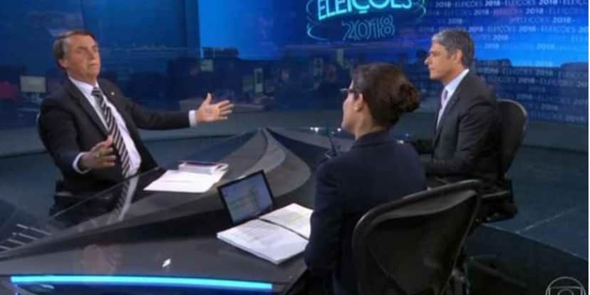 Jair Bolsonaro na entrevista de 2018, debatendo com Renata Vasconcellos e William Bonner (Reprodução: Globo) Jair Bolsonaro na entrevista de 2018, debatendo com Renata Vasconcellos e William Bonner (Reprodução: Globo)