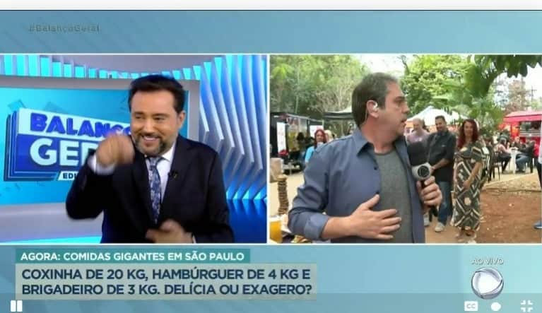 Geraldo Luís encorajou o repórter Aguiar Júnior a enfiar o dedo em um dos pratos do festival de comida- Foto: Reprodução/Record Geraldo Luís encorajou o repórter Aguiar Júnior a enfiar o dedo em um dos pratos do festival de comida- Foto: Reprodução/Record