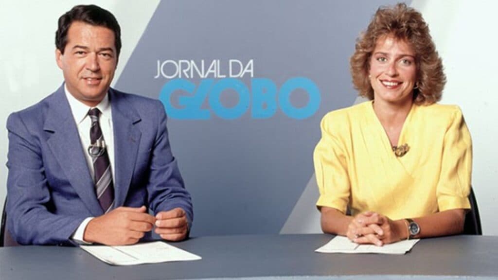 Jornalistas Eliakim Araújo e Leila Cordeiro comandando o Jornal da Globo (Foto: Reprodução/Internet). Jornalistas Eliakim Araújo e Leila Cordeiro comandando o Jornal da Globo (Foto: Reprodução/Internet).