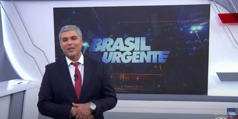 O jornalista está substituindo o próprio pai, que está de férias, no Brasil Urgente (Reprodução: Band) O jornalista está substituindo o próprio pai, que está de férias, no Brasil Urgente (Reprodução: Band)