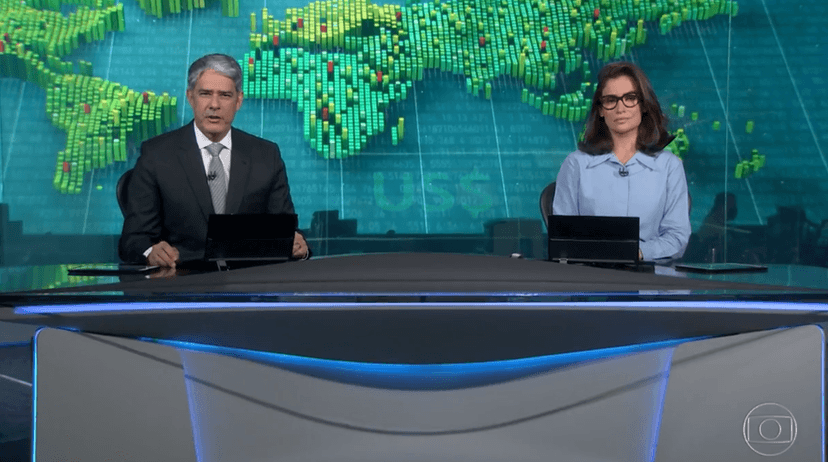 William Bonner e Renata Vasconcellos, na bancada do JN, da Globo (Foto Reprodução/Globoplay) William Bonner e Renata Vasconcellos, na bancada do JN, da Globo (Foto Reprodução/Globoplay)