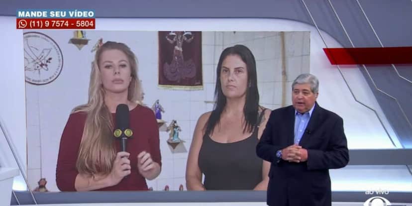 DAtena entrevistou a esposa do policial que foi morto na frente da farmácia (Reprodução: Band) DAtena entrevistou a esposa do policial que foi morto na frente da farmácia (Reprodução: Band)